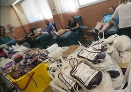 People donating blood.