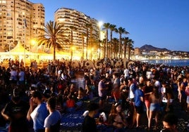 Archive image of people on the beach of La Malagueta, at San Juan.