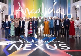 Regional minister of tourism, in the centre, with his team at the Nexus presentation.