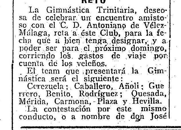 Malaga team line up with Carmona.