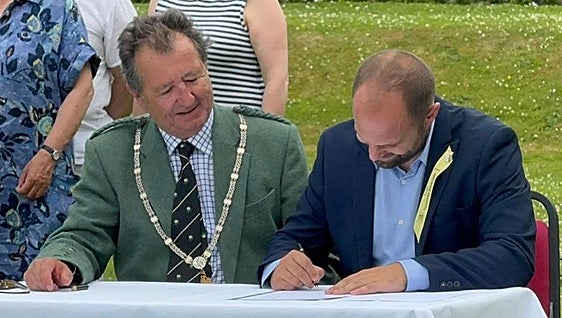 The small towns in Spain and Scotland that are united by a king's heart and a knight's loyalty