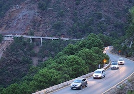 Some of the first vehicles using the reopened A-397 road earlier this Monday morning.