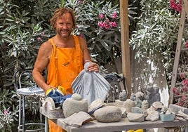 Scottish sculptor Toby Govan with a collection of his work.