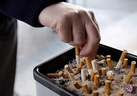 Ashtray with cigarette butts