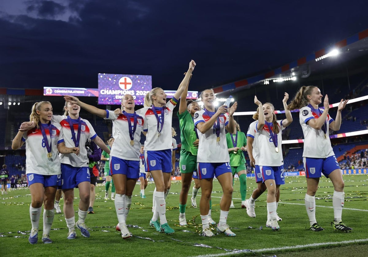England players celebrate their shootout victory.
