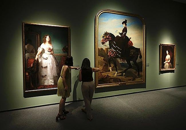 In the centre, Empress Eugenia in a Spanish-style portrait with Sierra de Teba in the background.