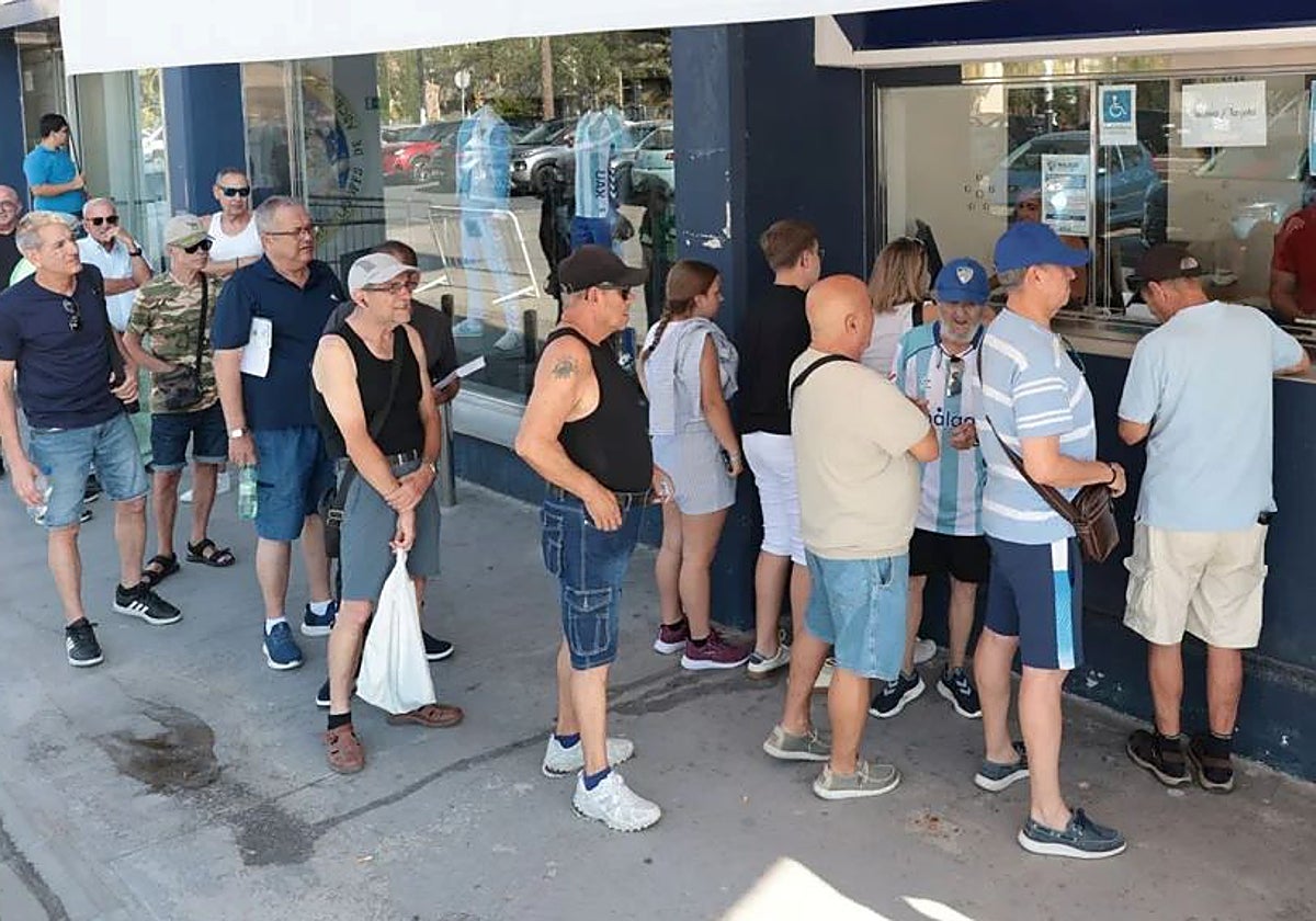 Queues of fans looking to renew from last season.