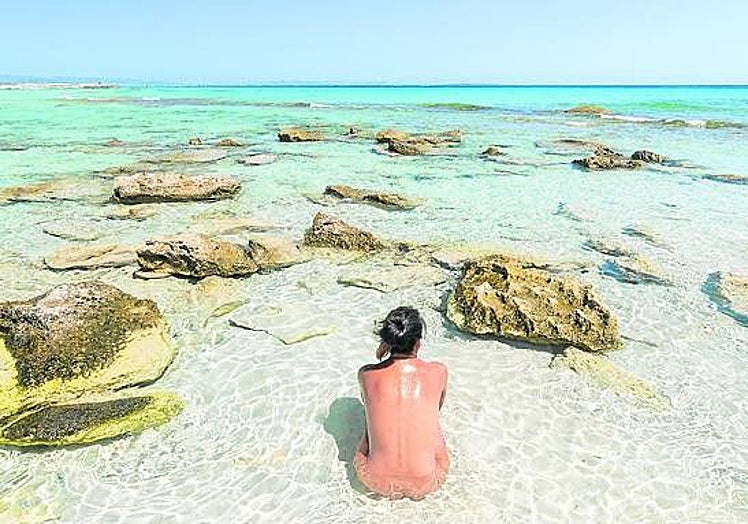 Swimming costumes are the order of the day in Formentera, which maintains its picture-postcard beaches.
