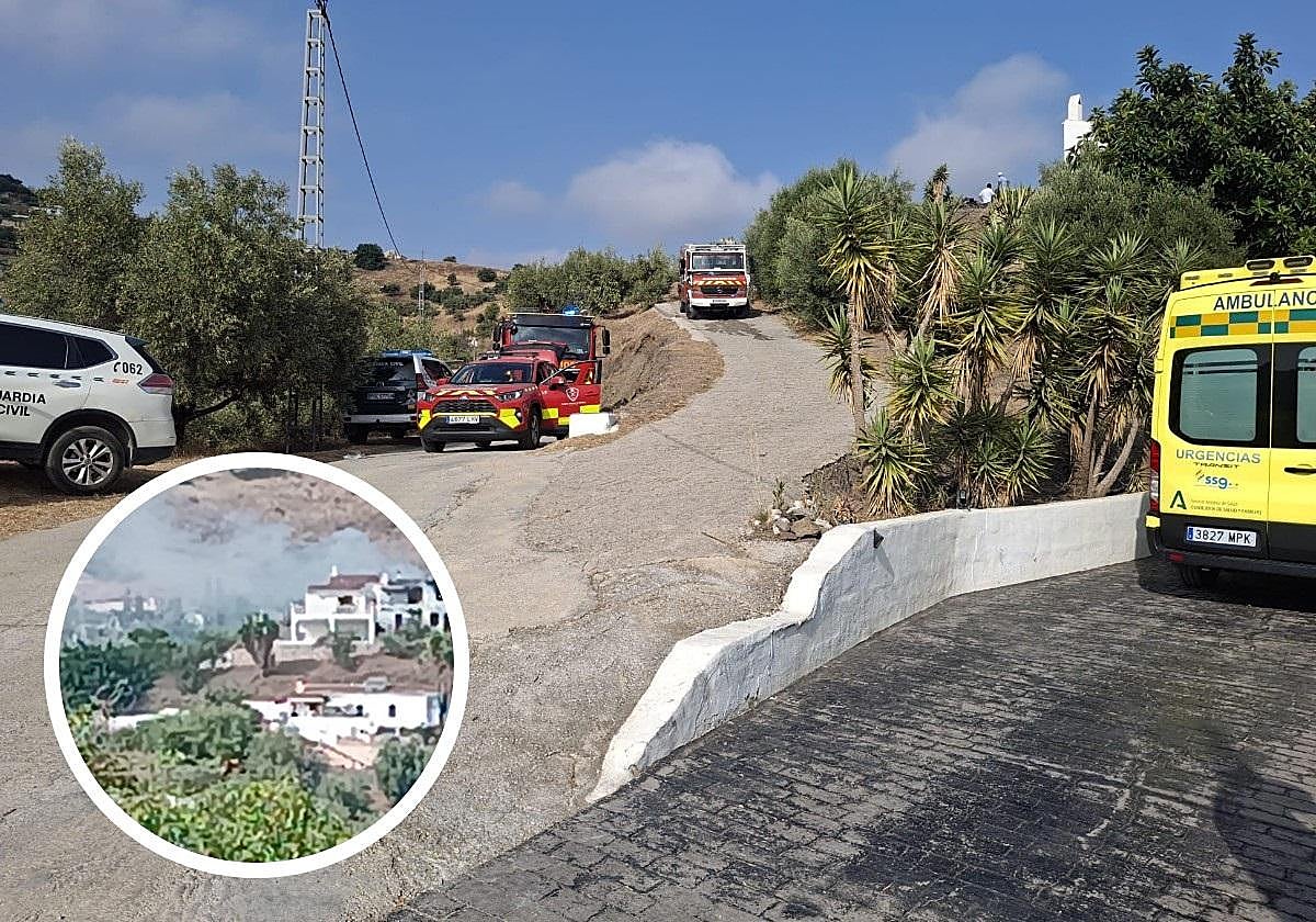 Firefighters, Guardia Civil and health workers, in the area of the incident. In the centre, the affected house.