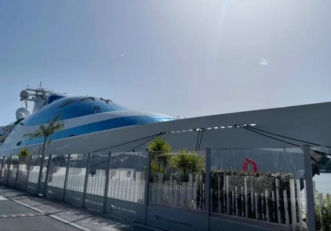 View of the Yas from the dock, with its characteristic blue glass windows.