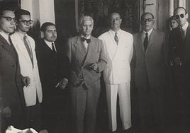 Fleming in the Cordovan hat.