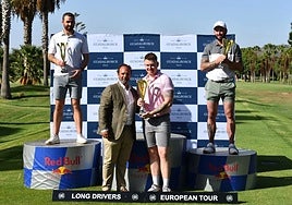 Massey receives his prize.