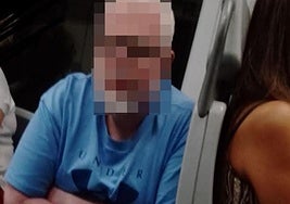 The pixelated photo of the suspect the mother took on the train and sent to her daughter to identify him.