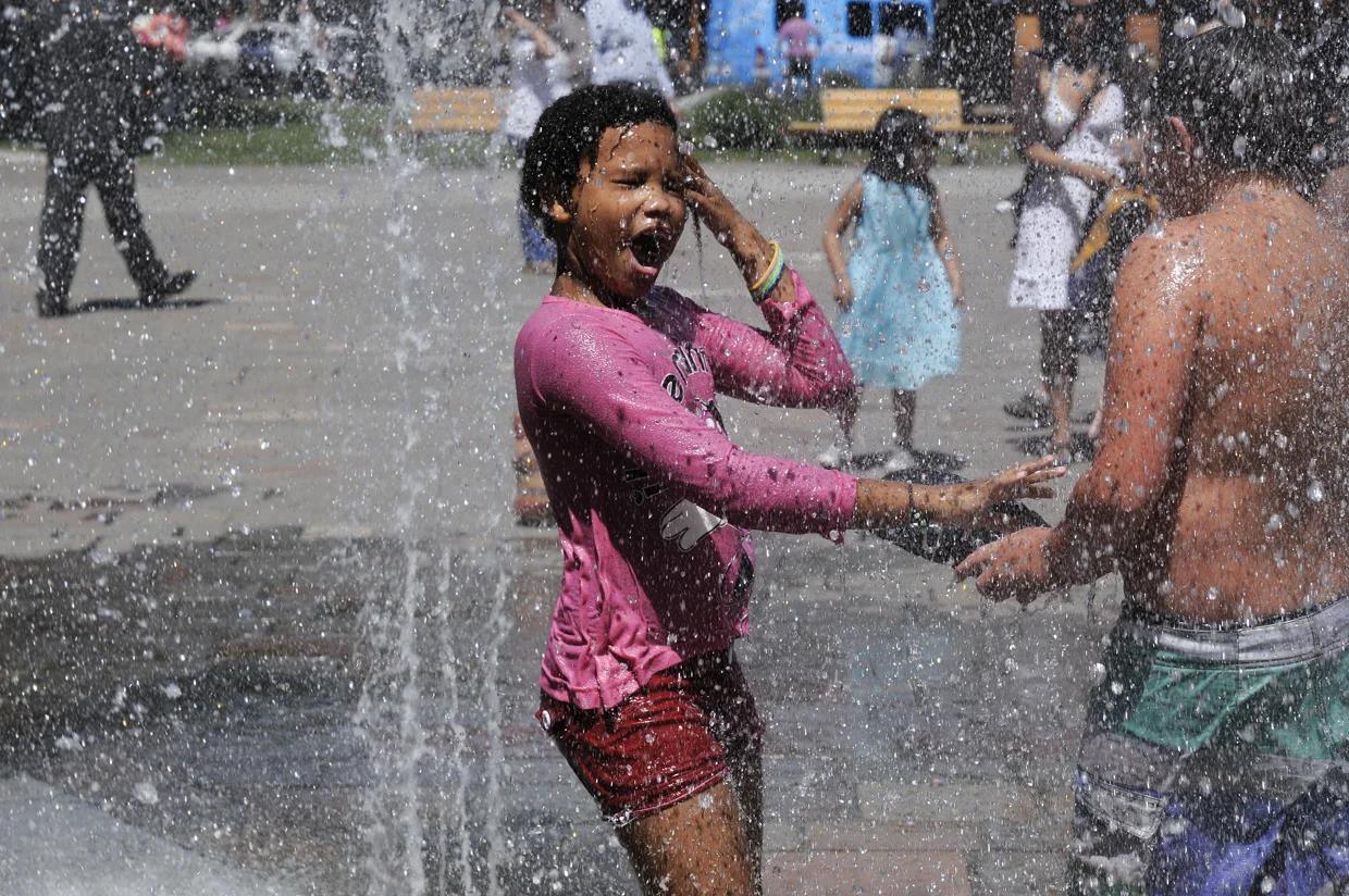 A girl cools off during a heatwave.