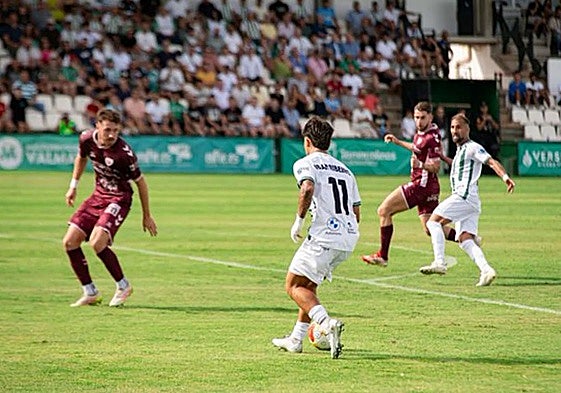 Iban Ribeiro progresses with the ball for Torremolinos.