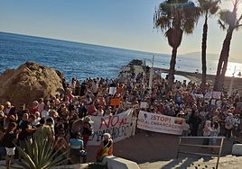 Protesters gathered on La Cala del Moral beach on Friday.