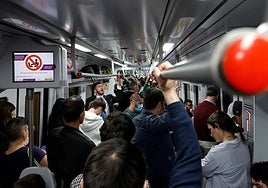 File image of passengers on board a packed Cercanías train on the Costa del Sol.