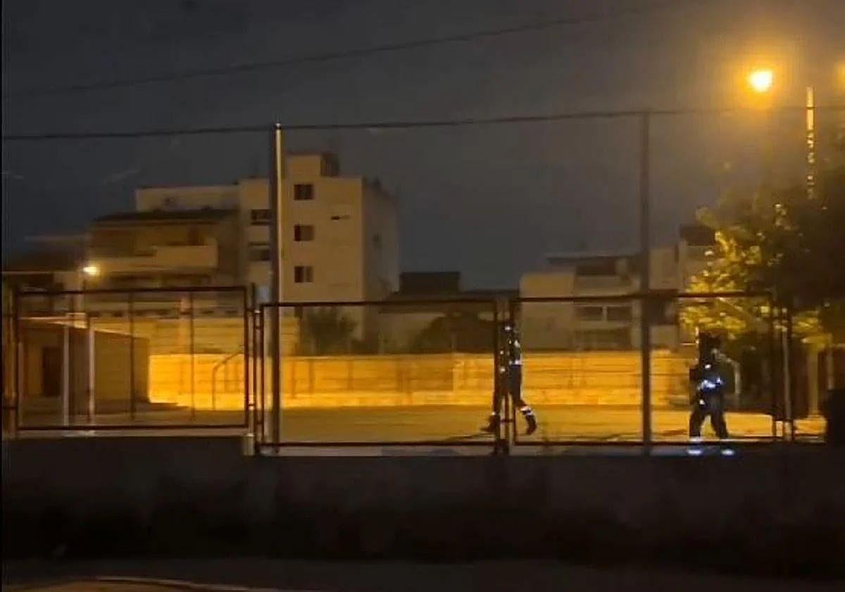 The firemen in the school grounds in the early hours of Tuesday morning.
