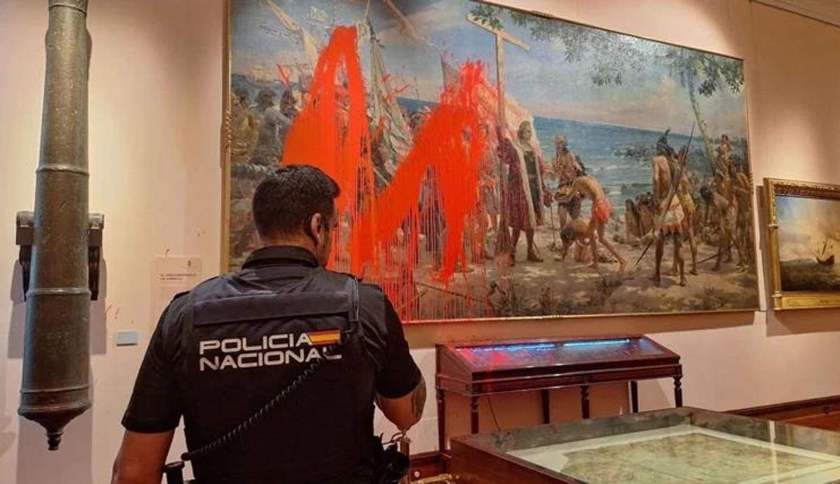This was the moment activists splashed red paint over huge Christopher Columbus canvas in Madrid museum