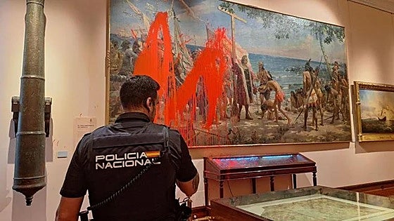 This was the moment activists splashed red paint over huge Christopher Columbus canvas in Madrid museum