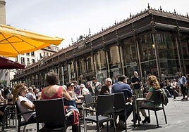 Busy bar and café terraces in the centre of Madrid.