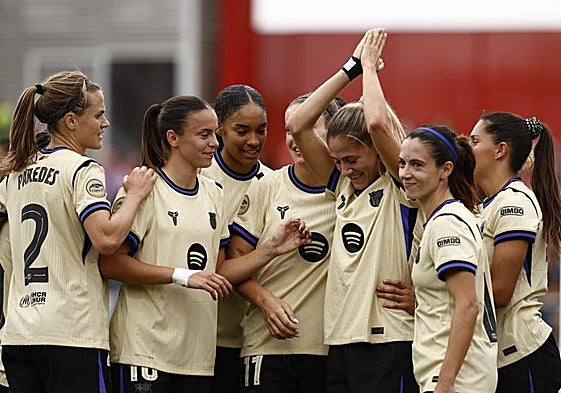 Barcelona celebrate their victory against Atlético on Sunday. EFE