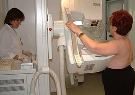 A patient undergoing a mammogram.