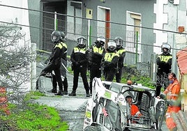 Manhunt for son after police rescue elderly woman from living among dead cats and squalor in Bilbao
