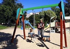 Family leisure time at a children's playground.
