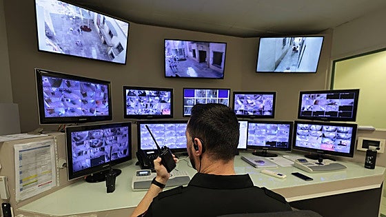 What do Malaga's museums spend on security to prevent thefts like the one at the Louvre?