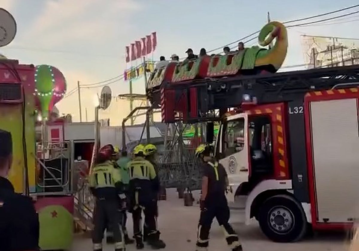 Firefighters rescue several people trapped on roller coaster ride at San Pedro fair