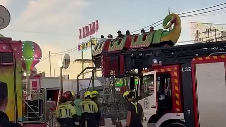 Firefighters rescue several people trapped on roller coaster ride at San Pedro fair