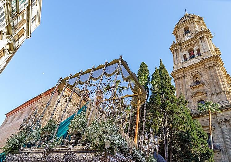 A Holy Week procession passing the Cathedral.