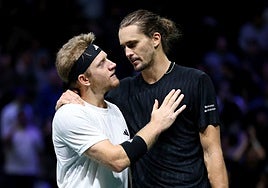 Davidovich and Zverev embrace following Thursday's match.
