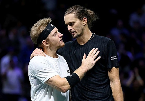 Davidovich and Zverev embrace following Thursday's match.