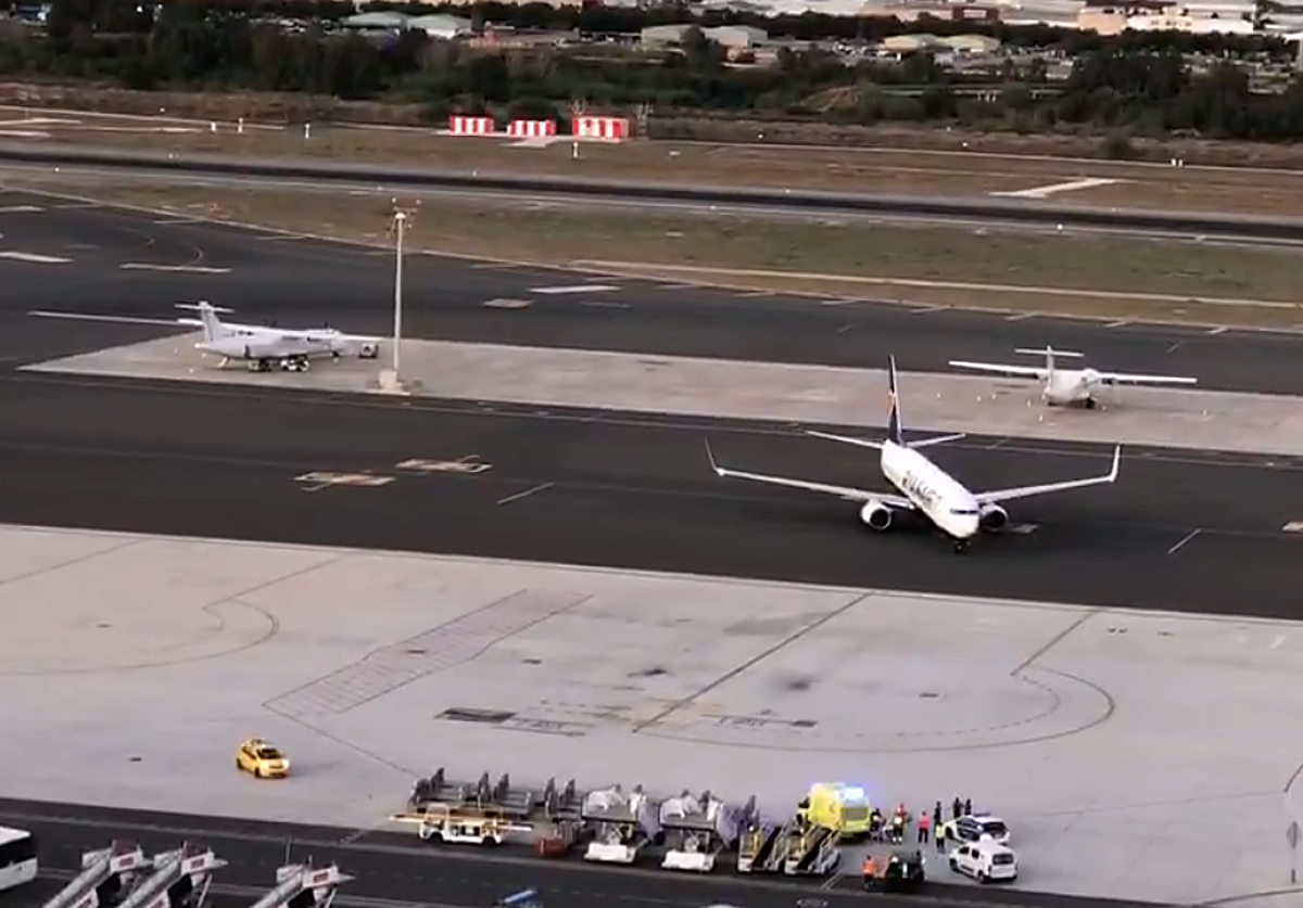 Image of diverted flight, with emergency services waiting on the apron.