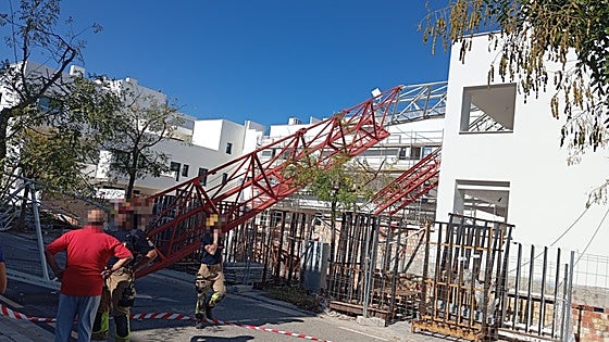 Lucky escape after construction crane crashes down onto residential building in Malaga