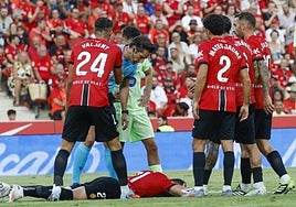 Antonio Raillo on the ground after stopping the ball with his head.