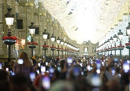File image of Calle Larios full of people to immortalise the festive light and sound show.
