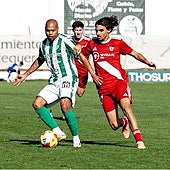 Antequera's veteran winger Biabiany shields the ball against Sevilla B.