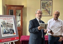 Minister John Cortes with the author Manolo Galliano.