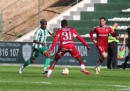 Antequera's Nico Njalla carries the ball.