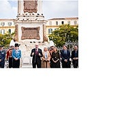 The mayor and the authorities, in front of the monolith in memory of those shot in the Plaza de la Merced.