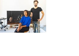 Flor Reiners and Fabio Baroli, in front of a piece by the Brazilian artist, at Finca Las Tinajas in Marbella.