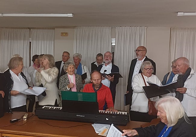 The German choir singing at the party after the service
