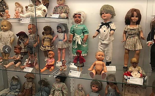 Dolls on show in this toy museum.
