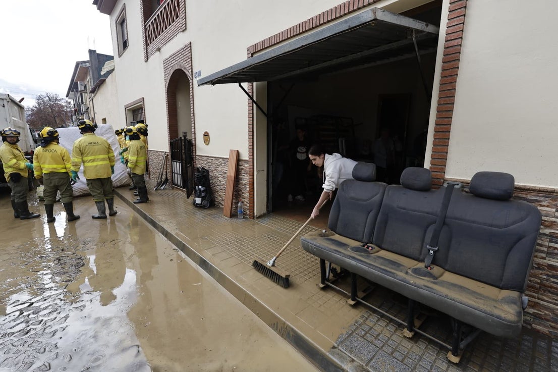 In pictures: Malaga town mops up after a night of torrential rain and the Guadalhorce river at its highest level on record