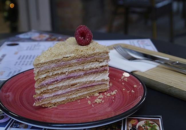 Medovik 'honey' cake with a raspberry cream filling