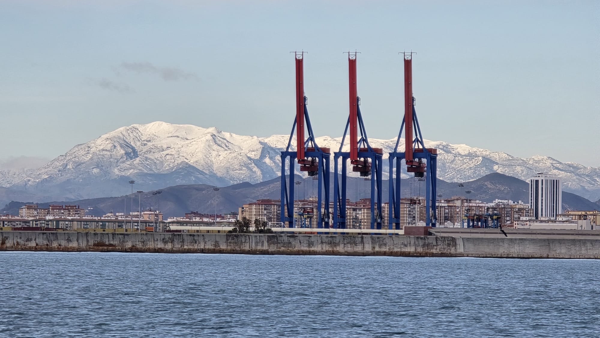 Snow on La Maroma seen from Malaga port.