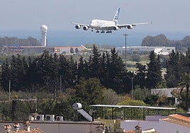 A plane approaches Malaga Airport.